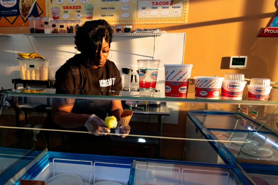 Sonia Norman, owner of Ice Cream Taco in West Columbia, makes an ice cream cone. Norman relocated her business after the first year, in part, because traffic congestion in Lexington made it too hard for customers to get in and out of her parking lot.