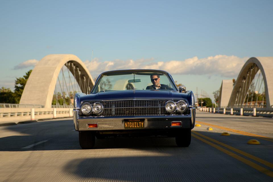 Manuel García-Rulfo's Mickey Haller drives through the Sixth Street Bridge in Los Angeles in a Lincoln convertible, a viaduct bridge that connects the Arts District in Downtown Los Angeles with the Boyle Heights neighborhood.