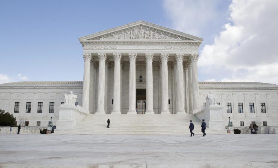 In this photo taken March 3, 2107, the Supreme Court in Washington. The Supreme Court ruled Monday, March 3, 2017, that racial bias in the jury room can be a reason for breaching the centuries-old legal principle of secrecy in jury deliberations. (AP Photo/J. Scott Applewhite)