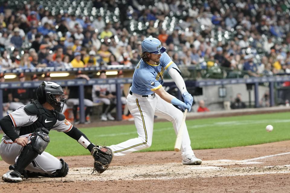 Milwaukee Brewers' Brian Anderson hits an RBI single during the fifth inning of a baseball game against the Baltimore Orioles Wednesday, June 7, 2023, in Milwaukee. (AP Photo/Morry Gash)