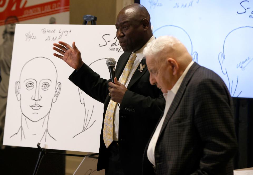 Attorney Ben Crump talks to the news media as forensic pathologist expert Dr. Werner Spitz listens during a news conference inside of a ballroom at the Westin Book Cadillac Detroit on April 19, 2022. The two, along with attorney Ven Johnson, talked about the autopsy results on Patrick Lyoya who was killed by a Grand Rapids police officer during a traffic stop on April 4, 2022.