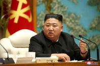 North Korean leader Kim Jong Un speaks during the 19th Meeting of the Political Bureau of the 7th Central Committee of WPK