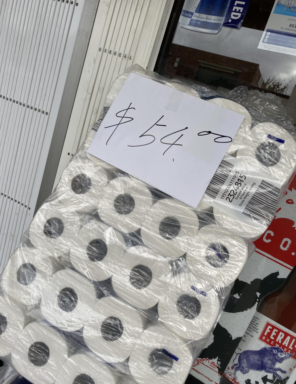 The toilet paper was spotted at the store with a $54 price tag sitting on it. 