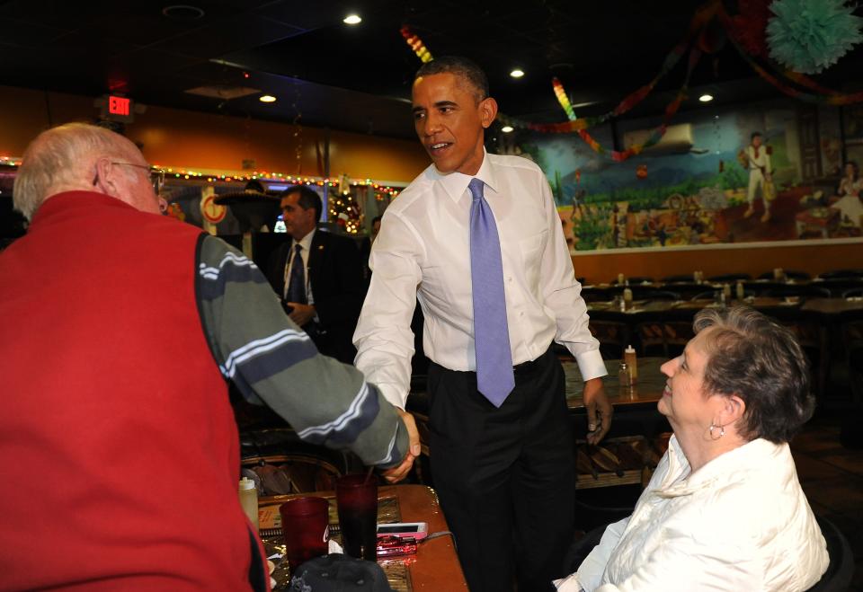 A 2014 picture of then President Barack Obama greeting guests during a visit to La Hacienda on Nolensville Road in South Nashville. He ordered steak tacos, flautas, and chips and guacamole to go.