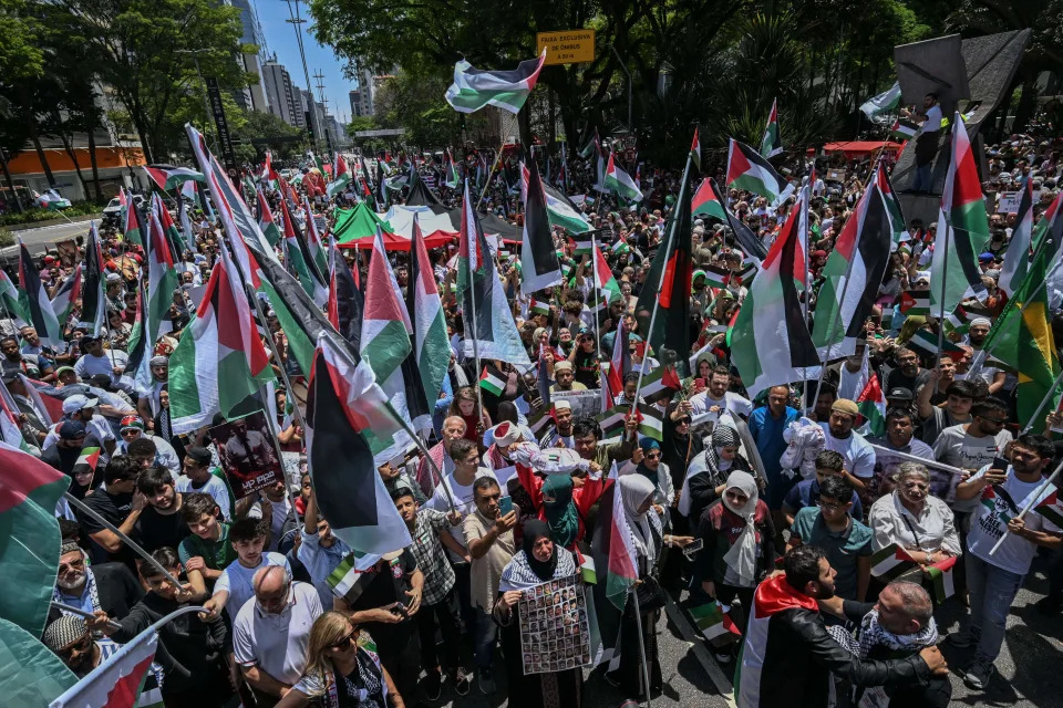 People took part in a demonstration against Israel's military offensive in the Gaza Strip in Sao Paulo, Brazil on Oct. 22. (Photo by Nelson Almeida/AFP via Getty Images)