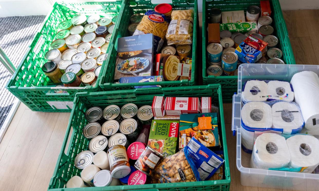 <span>Some food banks do not ask for referrals but many require slips or vouchers as part of a screening process. </span><span>Photograph: Vickie Flores/EPA</span>