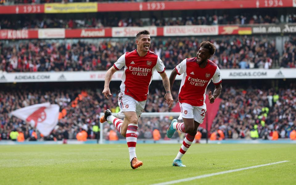 Arsenal's Granit Xhaka celebrates scoring their third goal against Manchester United - REUTERS