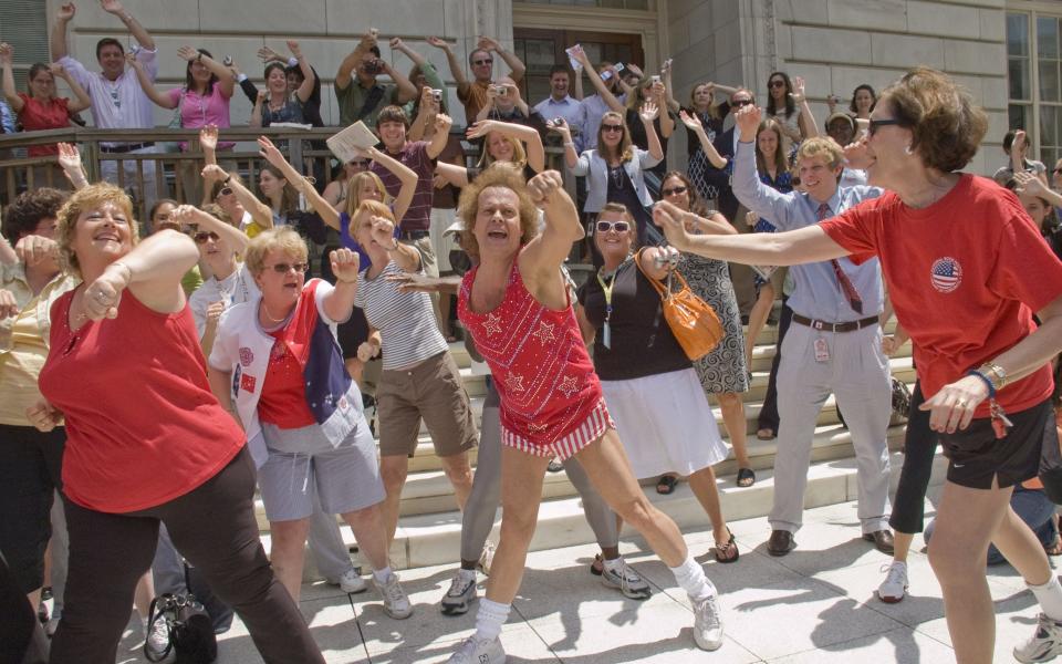 Richard Simmons leads a workout in Washington, in 2008 - Credit: Rex