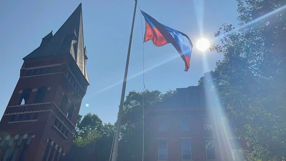 The Haitian Flag waving in Norwich. This is the first flag raising on the new flagpole at the city hall courtyard.