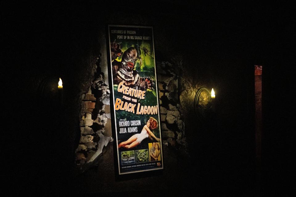 Decor is seen under spotlights at The Haunt, a horror-themed speakeasy inside Halloween attraction Slaughterhouse.
