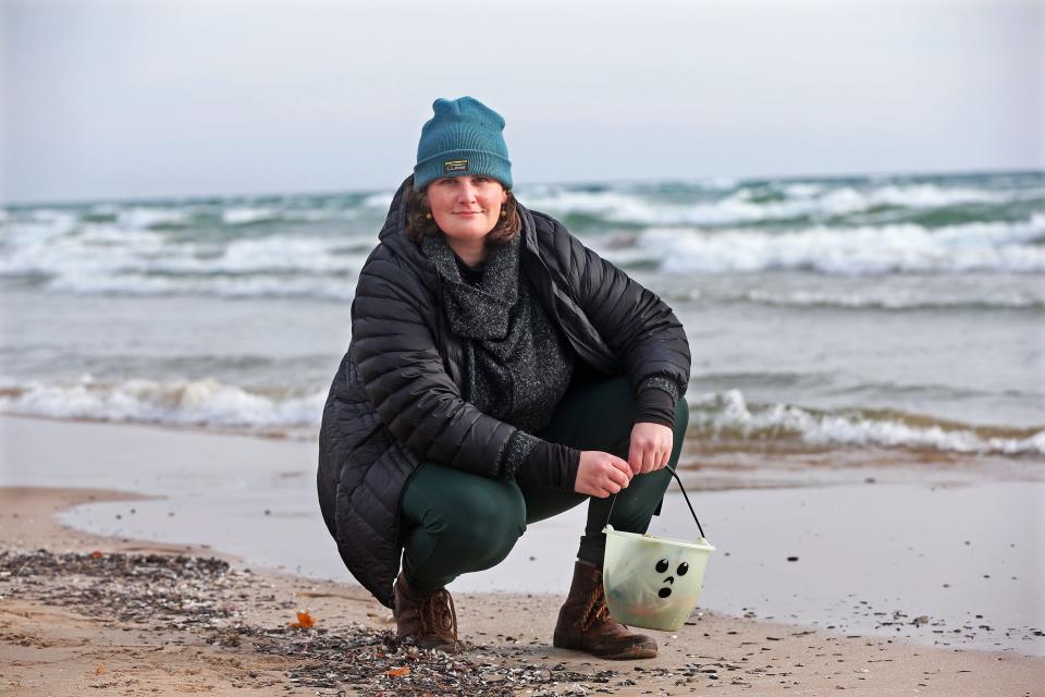 Geo Rutherford, a Wisconsin artist and educator, at Bradford Beach on Tuesday, Dec. 14, 2021, uses short-form videos to share her passion for the Great Lakes and her art inspired by them.  Rutherford has more than 1.1 million followers on TikTok and over 37 million likes on her videos.