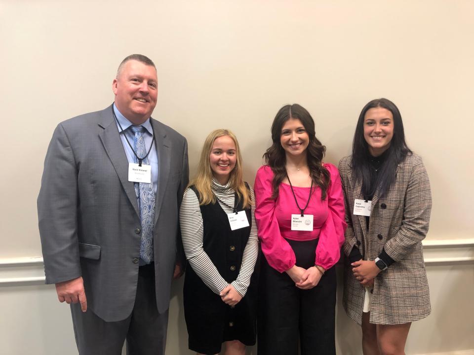 Kevin Kimmel, Mid-Ohio Educational Service Center superintendent, congratulates \the area's 2023 Franklin B. Walter honorees, from left, Bree Fellows, Kylee Bilancini and Kaya Capretta.