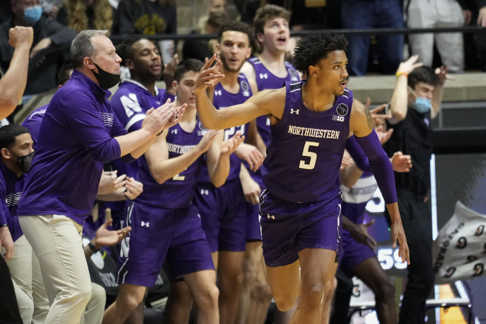 Northwestern guard Julian Roper II (5) reacts to hitting a shot while playing Purdue in the second half of an NCAA college basketball game in West Lafayette, Ind., Sunday, Jan. 23, 2022. Purdue won 80-60. (AP Photo/AJ Mast)