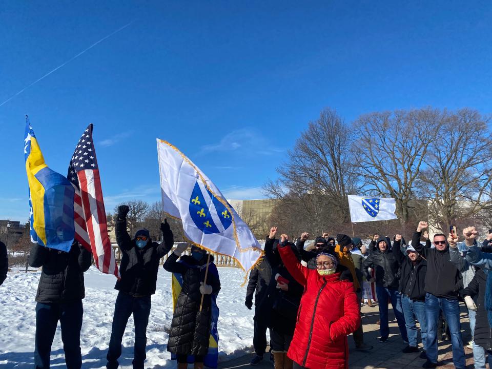 About a hundred people gathered Saturday in front of the Iowa State Capitol for a peace rally for Bosnia-Herzegovina.