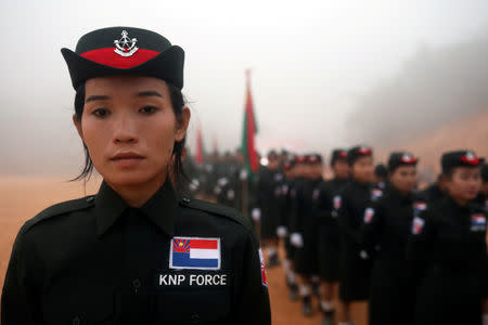 FILE PHOTO: Members of Karen National Party Force prepare for 70th anniversary of Karen National Revolution Day in Kaw Thoo Lei, Kayin state, Myanmar January 31, 2019. REUTERS/Ann Wang/File Photo