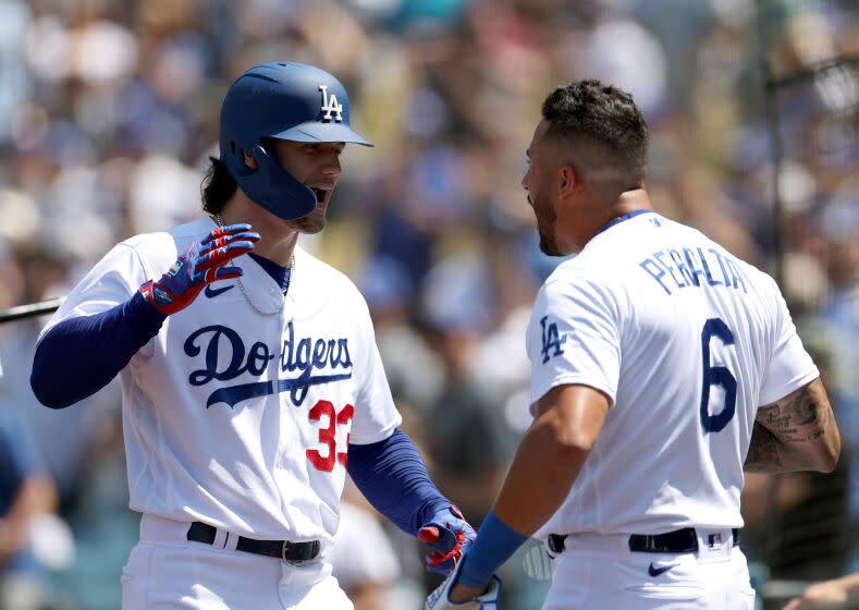 LOS ANGELES, CALIFORNIA - MAY 17: James Outman #33 of the Los Angeles Dodgers celebrates his grand slam.