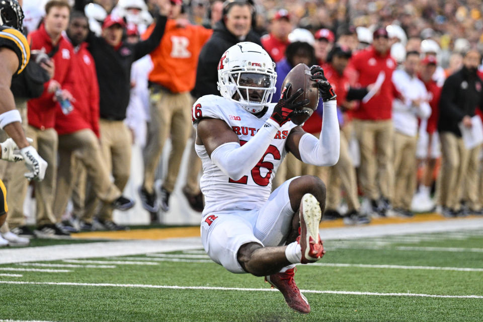 Nov 11, 2023; Iowa City, Iowa, USA; Rutgers Scarlet Knights defensive back Max Melton (16) intercepts a pass from Iowa Hawkeyes quarterback Deacon Hill (not pictured) during the second quarter at Kinnick Stadium. Mandatory Credit: Jeffrey Becker-USA TODAY Sports