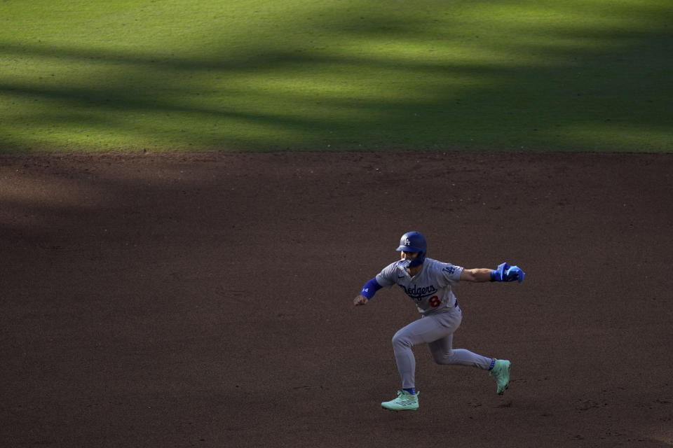 Los Angeles Dodgers' Kiké Hernandez leads off from second base after hitting a double during the fifth inning of a baseball game against the San Diego Padres, Sunday, Aug. 6, 2023, in San Diego. (AP Photo/Gregory Bull)