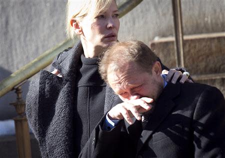 Actress Cate Blanchett and her husband Andrew Upton leave the funeral of actor Philip Seymour Hoffman at St. Ignatius church in the Manhattan borough of New York February 7, 2014. REUTERS/Carlo Allegri