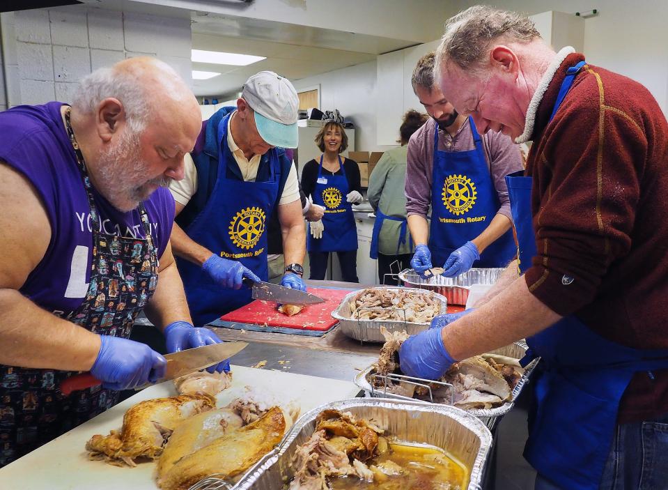 Volunteers work in the kitchen at the Portsmouth Rotary Club's annual Thanksgiving community dinner in 2020, which was the Rotary's 47th dinner, was sponsored by the Portsmouth Regional Hospital and held at St. Nicholas Greek Church.