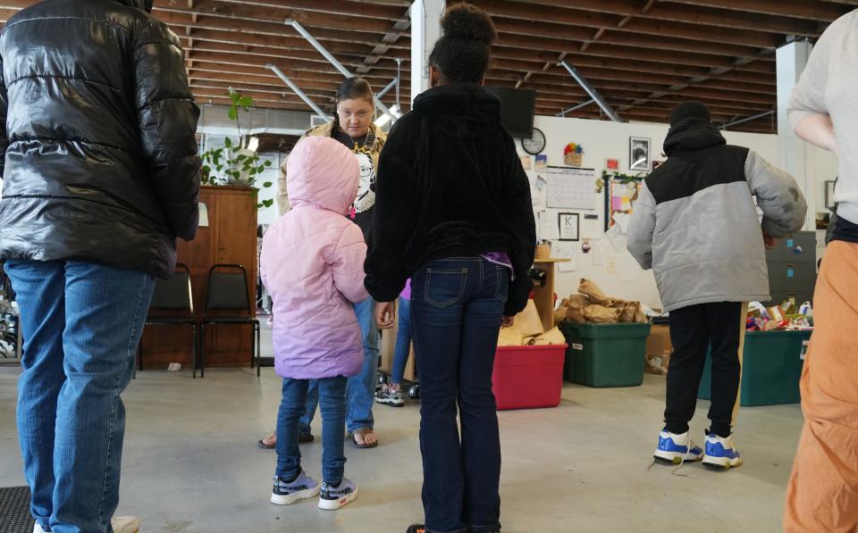 Open Shelter volunteer AnnMarie Buswell greets first-time visitors to the well-known Parsons Avenue shelter in Columbus. Even though she has navigated the Columbus housing crisis for other people, she is now having a difficult time finding housing and help for herself.