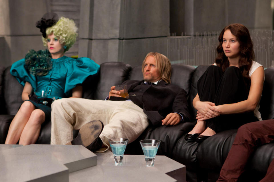 Elizabeth Banks Woody Harrelson and Jennifer Lawrence appearing in film 'The Hunger Games' 2012 This is a PR photo WENN does