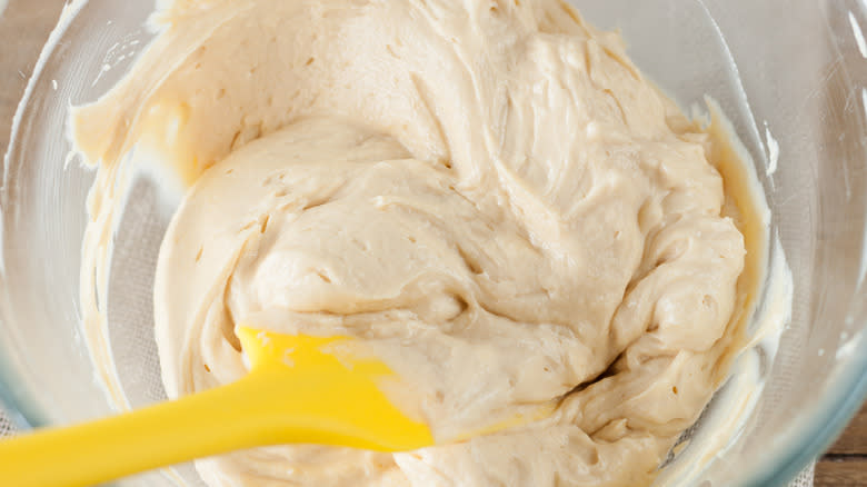 Mixing frosting in bowl