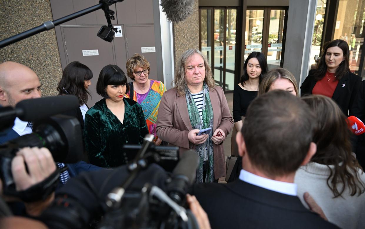 Roxanne Tickle speaks to the media after the court ruling in Sydney, Australia