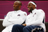 LONDON, ENGLAND - JULY 29: Kobe Bryant #10 and LeBron James #6 of the United States smile while on the bench against France in the Men's Basketball Game on Day 2 of the London 2012 Olympic Games at the Basketball Arena on July 29, 2012 in London, England. (Photo by Jamie Squire/Getty Images)