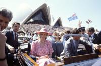 <p>Charles and Diana ride through a crowd of Australians outside the Sydney Opera House. <br></p>