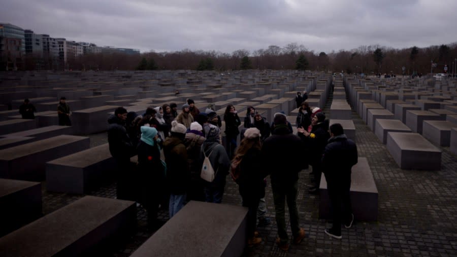 Tourists visit the Holocaust Memorial in Berlin, Germany, on International Holocaust Remembrance Day, Saturday, Jan. 27, 2024. The International Holocaust Remembrance Day marks the anniversary of the liberation of the Nazi death camp Auschwitz – Birkenau on Jan. 27, 1945. (AP Photo/Markus Schreiber)