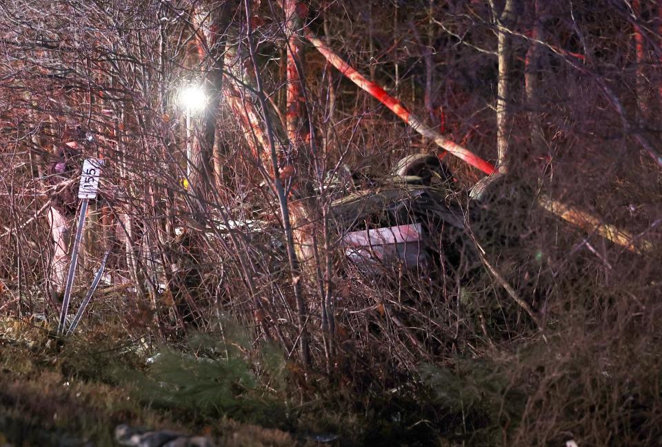 First responders assist at a fatal crash on Route 24 southbound in Bridgewater on Monday, Dec. 19, 2022.