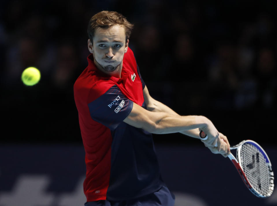 Russia's Daniil Medvedev returns to Germany's Alexander Zverev during their ATP World Tours Finals singles tennis match at the O2 Arena in London, Friday, Nov. 15, 2019. (AP Photo/Alastair Grant)