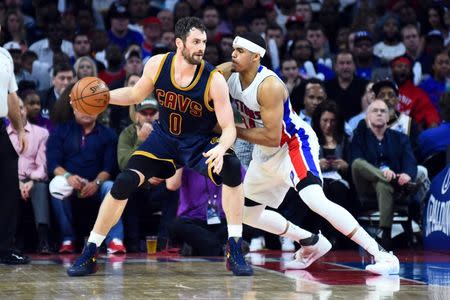 Apr 22, 2016; Auburn Hills, MI, USA; Cleveland Cavaliers forward Kevin Love (0) backs down Detroit Pistons forward Tobias Harris (34) during the third quarter in game three of the first round of the NBA Playoffs at The Palace of Auburn Hills. Mandatory Credit: Tim Fuller-USA TODAY Sports