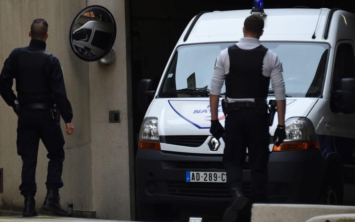 Police vehicle arrives at Nimes court - AFP