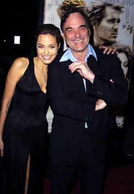 Angelina Jolie and director Oliver Stone at the Hollywood premiere of Warner Bros. Alexander