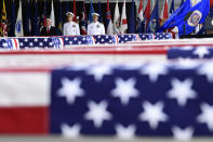 <p>Vice President Mike Pence, Commander of U.S. Indo-Pacific Command Adm. Phil Davidson, center, and Rear Adm. Jon Kreitz, deputy director of the POW/MIA Accounting Agency, look at transfer cases at a ceremony marking the arrival of the remains believed to be of American service members who fell in the Korean War at Joint Base Pearl Harbor-Hickam, Hawaii, Wednesday, Aug. 1, 2018. North Korea handed over the remains last week. (Photo: Susan Walsh/AP) </p>