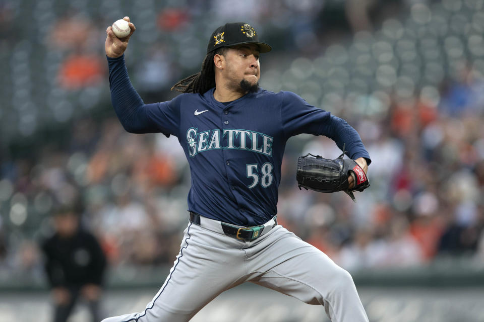 Seattle Mariners starting pitcher Luis Castillo (58) throws to a Baltimore Orioles batter during the first inning of a baseball game Saturday, May 18, 2024, in Baltimore. (AP Photo/Jose Luis Magana)