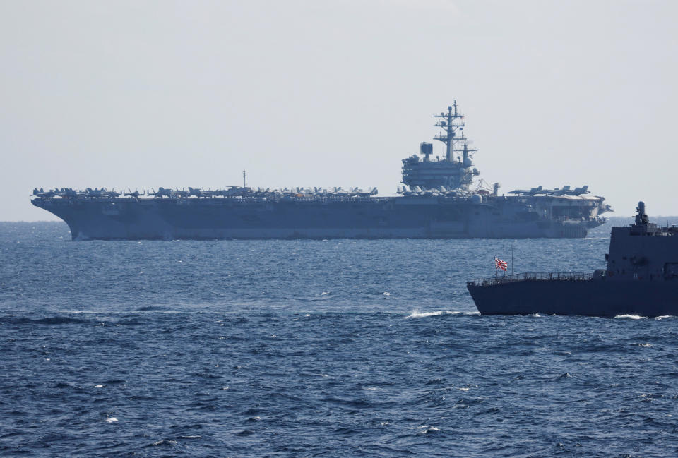 The USS Ronald Reagan, a Nimitz-class nuclear-powered super carrier, takes part in the International Fleet Review to commemorate the 70th anniversary of the foundation of Japan's Maritime Self-Defense Force, at Sagami Bay, off Yokosuka, south of Tokyo, Japan November 6, 2022. REUTERS/Issei Kato/Pool