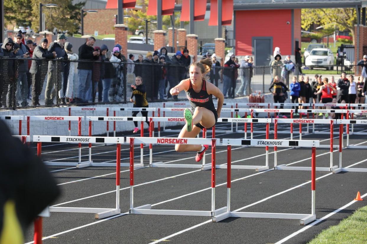 Roland-Story's Selah Helegson anchors the shuttle hurdle relay during the Norsemen Relays on Thursday, April 18, 2024, at the Roland-Story Sports Complex.