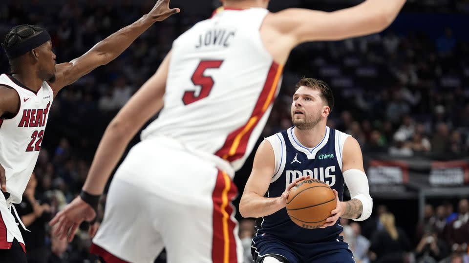 Dončić looks to shoot during the game. - LM Otero/AP