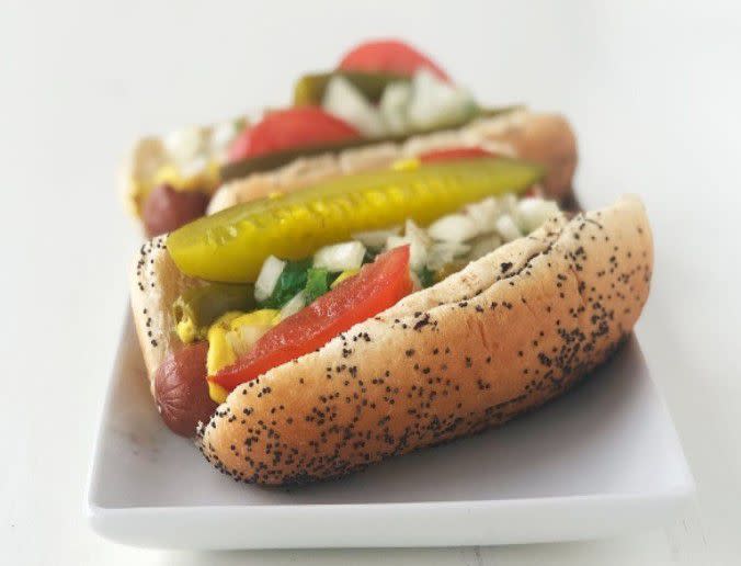 <p>It’s not a true Chicago hot dog unless it’s a Vienna Beef dog, which debuted at Chicago’s World’s Columbian Exposition in 1893. This Chicago-Style Hot Dog Kit includes their all-beef franks, buns, sport peppers, green relish, yellow mustard, and celery salt – just add tomato, onions, and pickle spears for the complete experience!</p><p><br></p><p><i>(Related: <a href=/& rel="nofollow noopener" target="_blank" data-ylk="slk:America's Regional Hot Dog Styles;elm:context_link;itc:0;sec:content-canvas" class="link rapid-noclick-resp">America's Regional Hot Dog Styles</a>)</i></p><span class="copyright"> Vienna Beef </span>