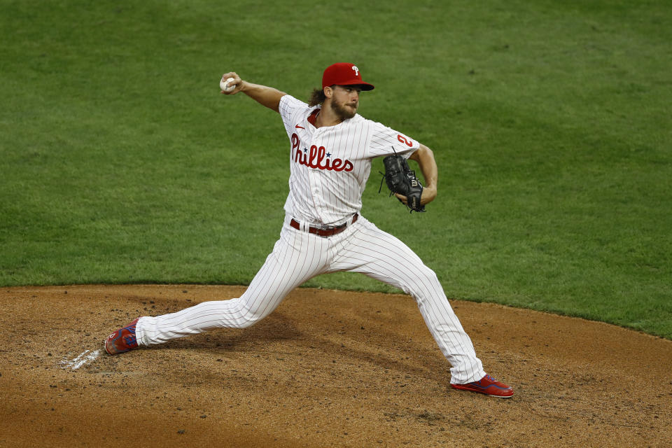 Philadelphia Phillies' Aaron Nola pitches during the first inning of the second baseball game in a doubleheader against the New York Yankees, Wednesday, Aug. 5, 2020, in Philadelphia. (AP Photo/Matt Slocum)