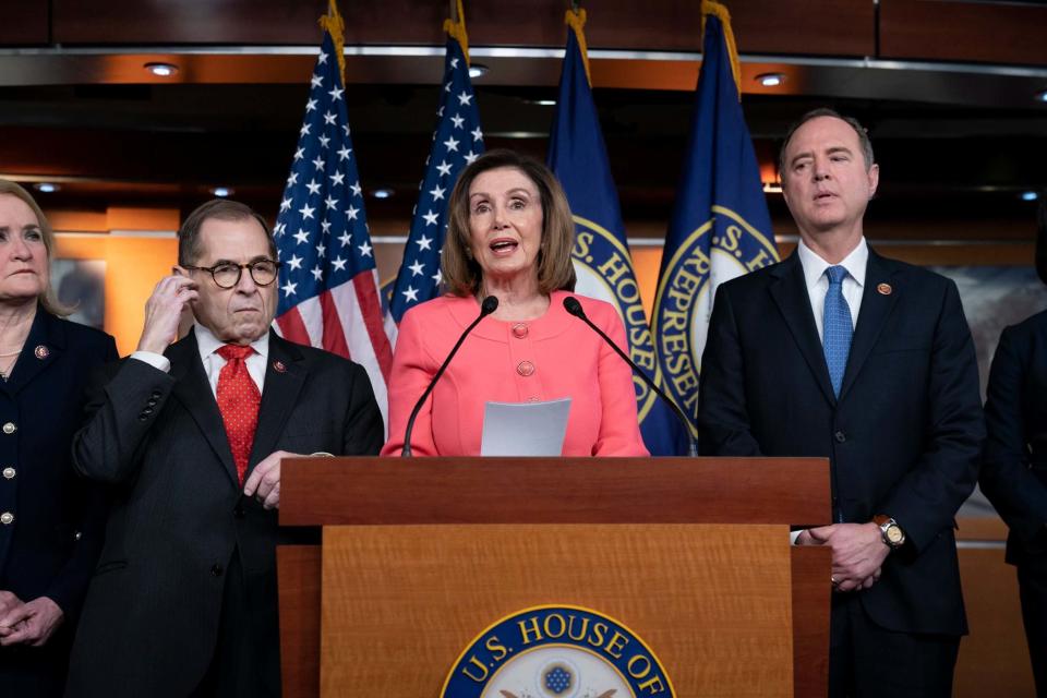 Mr Nadler, left, Ms Pelosi, centre, and Mr Schiff, right (AP)