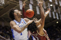 Duke's Dereck Lively II, left, and Boston College's T.J. Bickerstaff, right, battle for a rebound during the first half of an NCAA college basketball game in Durham, N.C., Saturday, Dec. 3, 2022. (AP Photo/Ben McKeown)