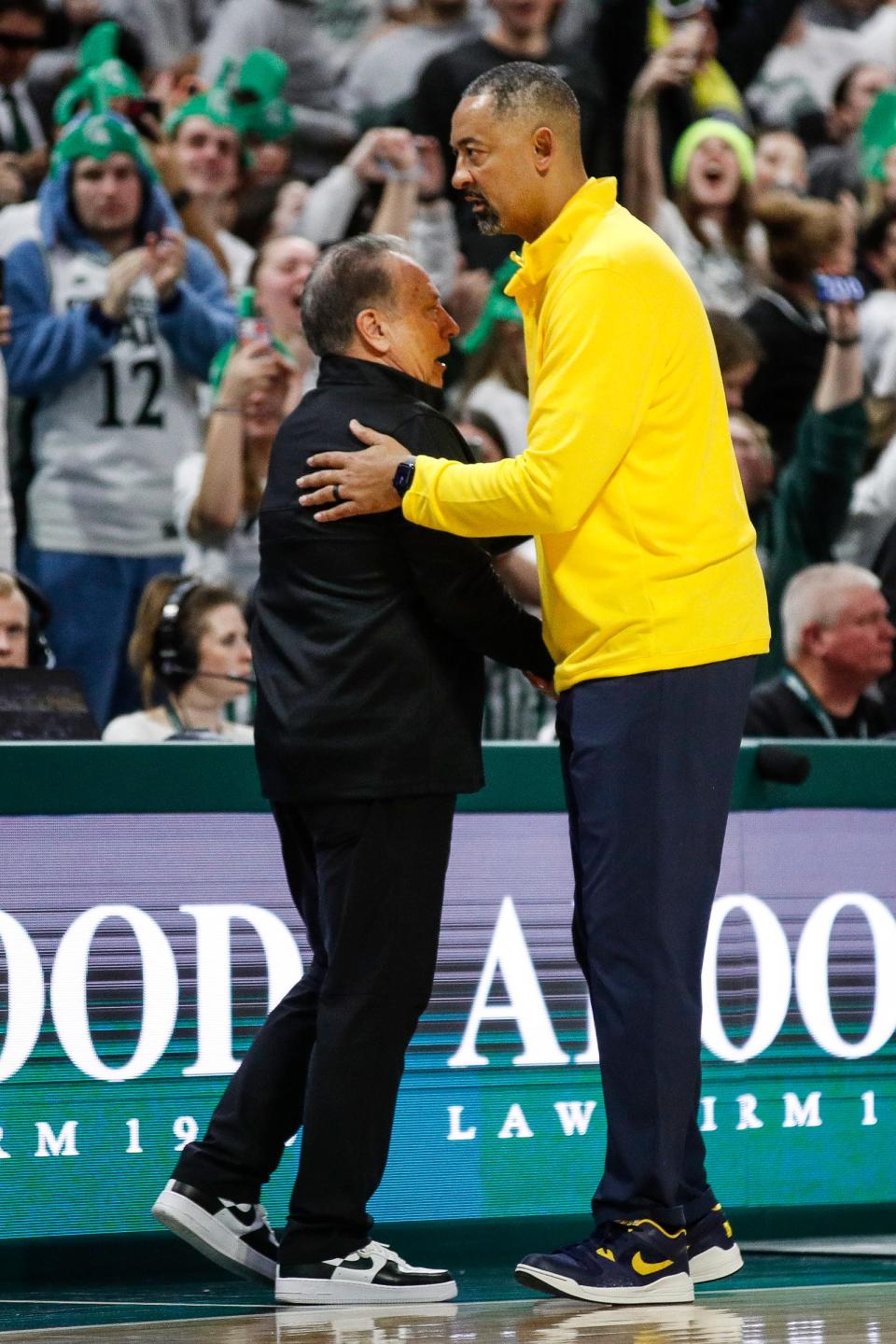 Michigan State head coach Tom Izzo shakes hands with Michigan head coach Juwan Howard after MSU's 81-62 win at Breslin Center in East Lansing on Tuesday, Jan. 30, 2024.