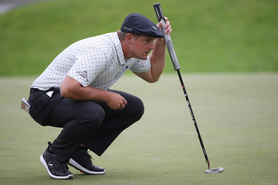 Bryson DeChambeau lines up a putt. (Photo by Sean M. Haffey/Getty Images)