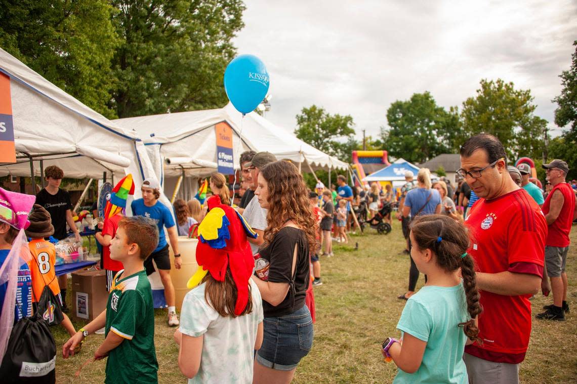 Christ the King’s Oktoberfest features many kid-friendly games and inflatables.