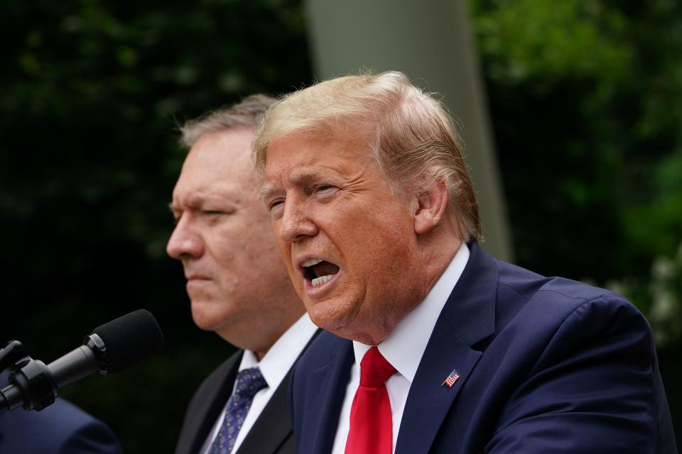 US President Donald Trump, with US Secretary of State Mike Pompeo, holds a press conference on China on May 29, 2020, in the Rose Garden of the White House in Washington, DC. - Trump held the press conference amid soaring tensions between the two powers, including over the status of Hong Kong and the novel coronavirus pandemic. (Photo by MANDEL NGAN / AFP) (Photo by MANDEL NGAN/AFP via Getty Images)