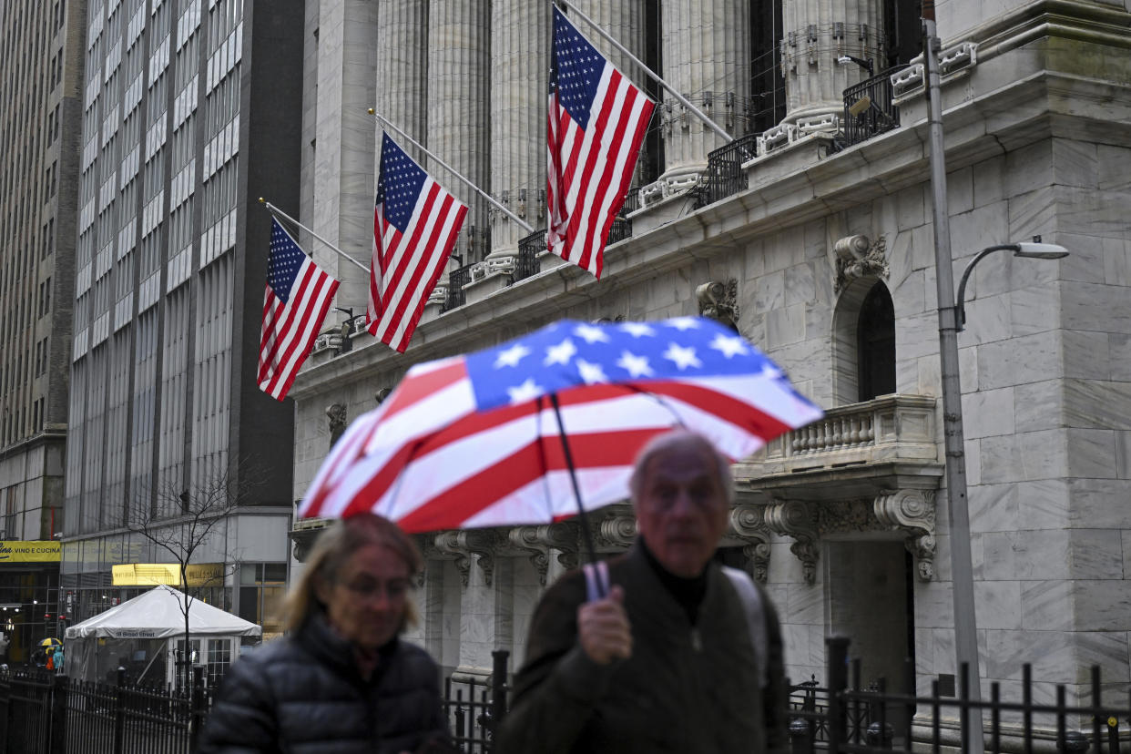 Photo by: NDZ/STAR MAX/IPx 2024 3/28/24 People walk past the New York Stock Exchange (NYSE) on March 28, 2024 in New York City.